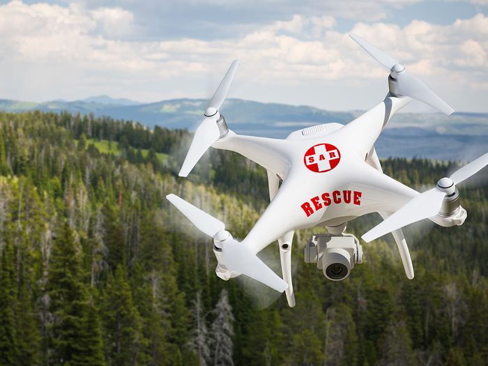 Search and rescue drone flying over forest